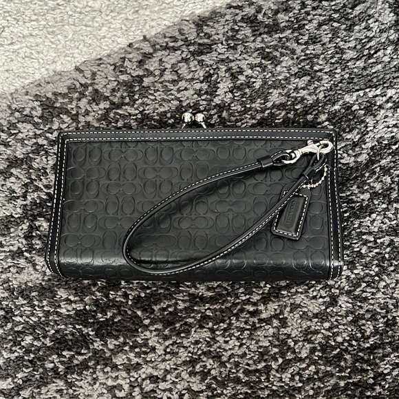 Coach Handbags - COACH embossed kisslock wristlet clutch, black, pre-loved!